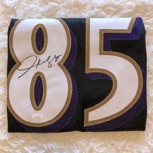 Baltimore Ravens jersey (autographed by Derrick Mason)
